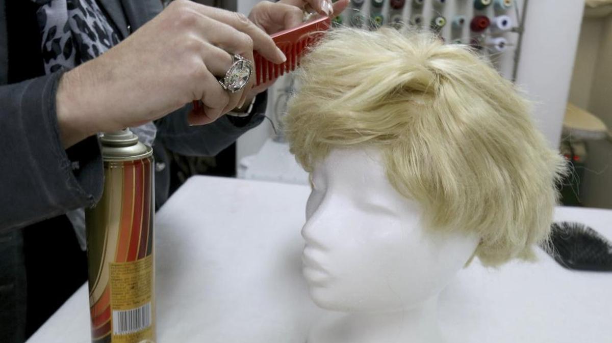 Fashioning a hairpiece in Austria Monday.