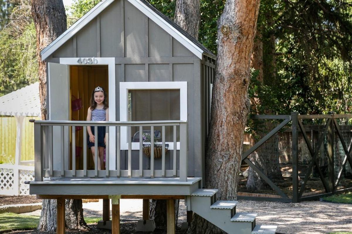Clara Scigliano, 6, has a miniature she shed in the form of a tree house.