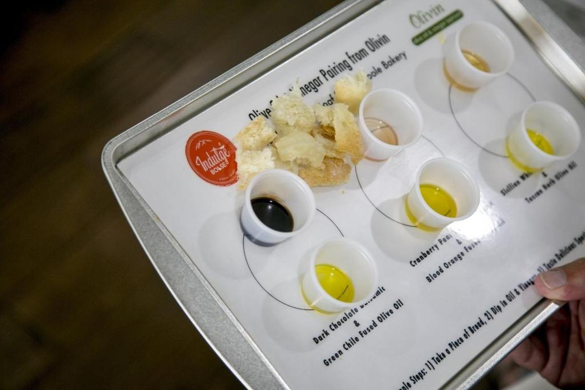 This tin tray contains the some olive oils and balsamic vinegars for the tasting at Olivin, an olive oil and vinegar taproom, in Downtown Boise.