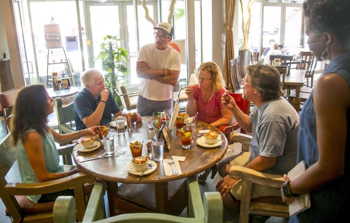 Bacon owner and chef John Berrryhill chats up the Indulge Boise tour guests with stories about his first career as a professional dancer in Los Angeles.