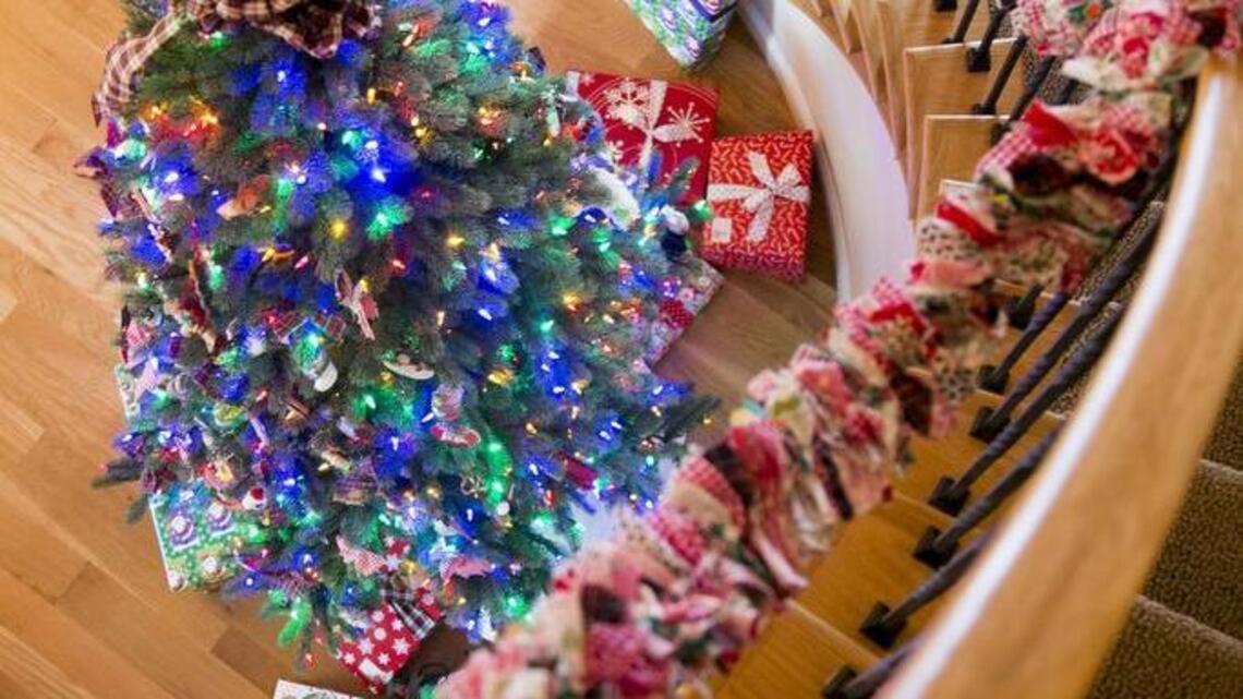 Holiday house: A mantle heavy with 15 stockings - and more