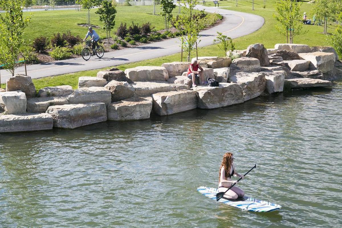 There are many ways to experience Esther Simplot Park. Paddleboarders can travel travel between its three ponds uninterrupted. Cyclists ride the Boise Greenbelt path.