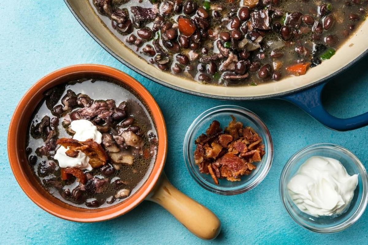 Bacon, red bell pepper and jalapeño deepen the flavor of this earthy black bean soup. The stove-top version makes a nuanced broth, while the Instant Pot version yields a somewhat starchier-tasting broth. Both are tasty.