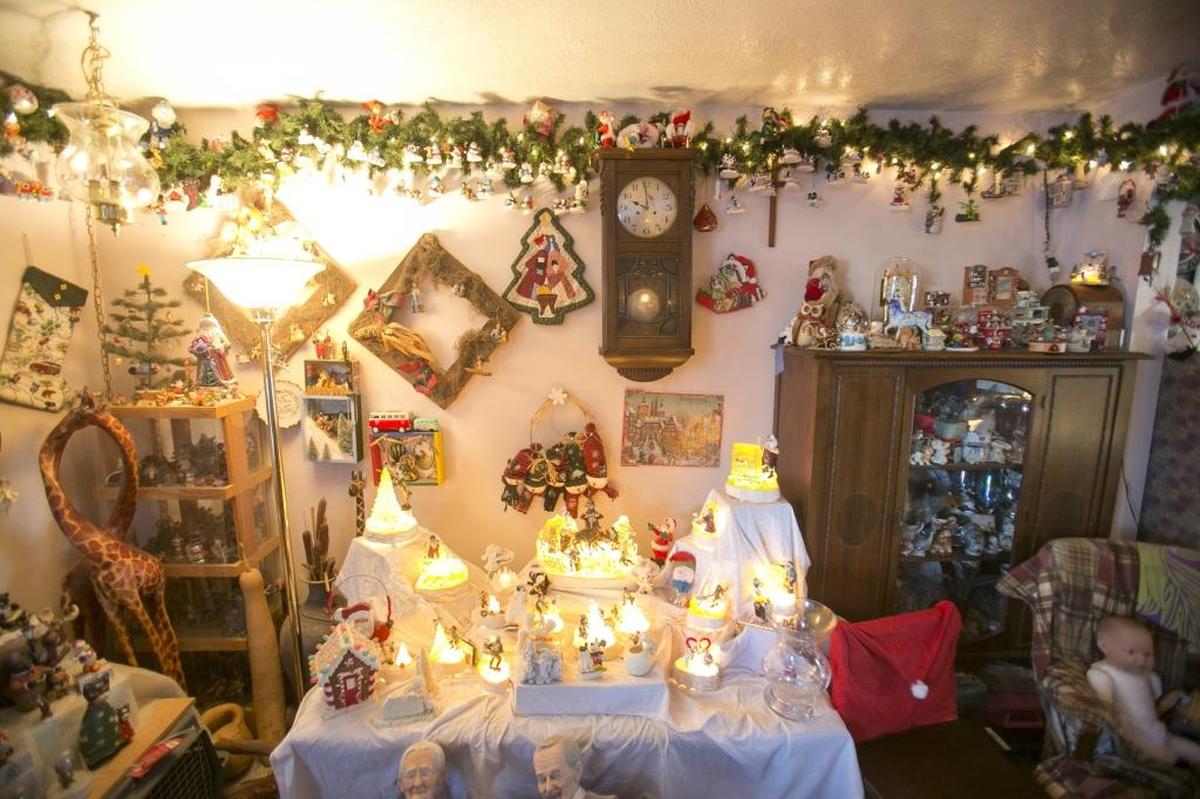 Each year Anne Scherrer, of Boise, decks out her house with cheery bobbles, statues and garlands to show off her treasured Hallmark ornament collection.