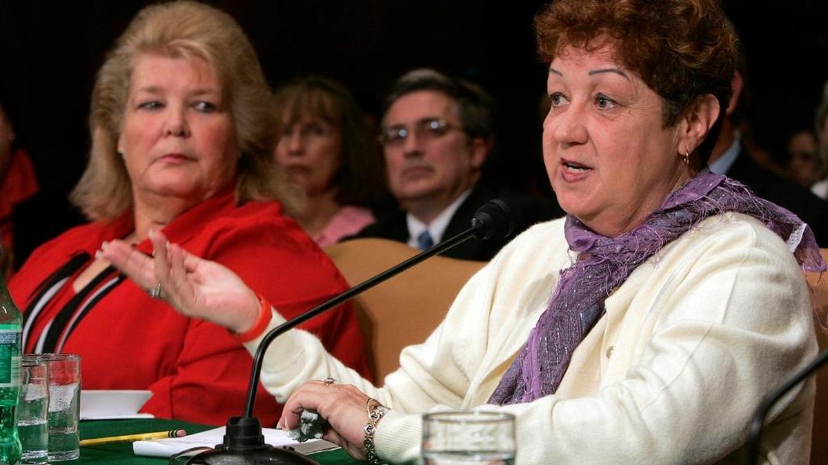 Norma McCorvey (“Roe”) speaks as Sanda Cano (“Doe”) looks on at a Senate Judiciary Committee hearing on the consequences of the Roe vs. Wade and Doe vs. Bolton abortion cases in the Supreme Court in Washington on June 23, 2005.