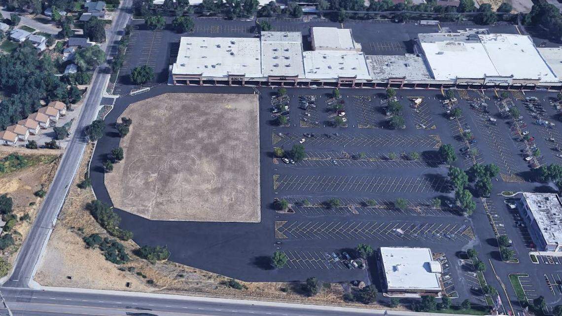 The brown area is the site of a former Fred Meyer store, torn down in 2010 at the Hillcrest Shopping Center. Apartments are proposed there. Phillippi Street is at left, Overland Road at bottom.