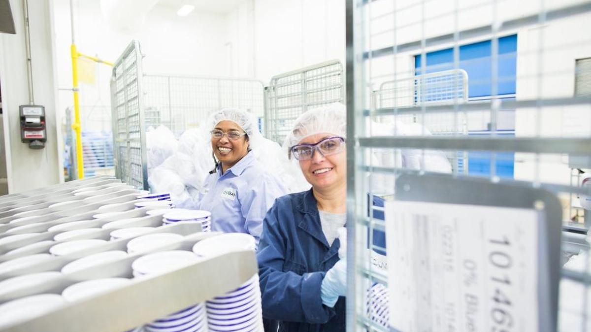 Two Chobani employees. “It was important to me that everyone at the company have this time, especially the people in our plants,” founder Hamdi Ulukaya said. “I recognize that middle-class parents often lack the resources and the time they need and deserve to be with a new child.”