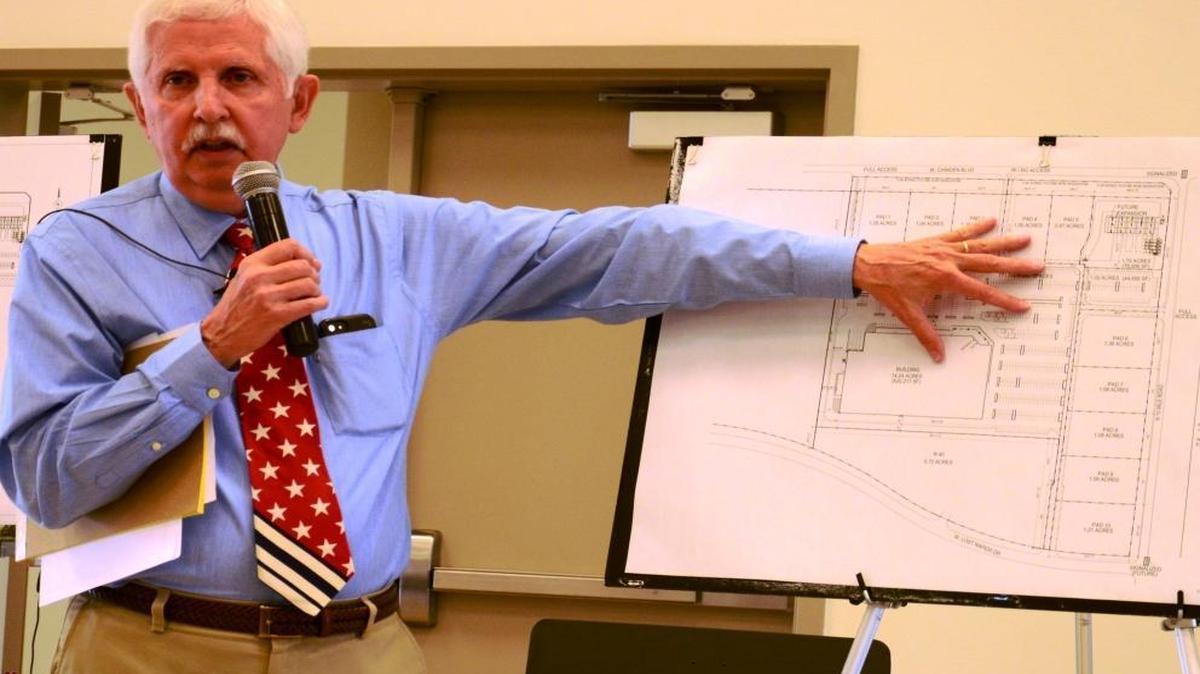 Mike Wardle, director of planning for the Brighton Corporation, shows a preliminary site plan for the new Costco store planned for the intersection of Chinden Boulevard and Ten Mile Road in Meridian.