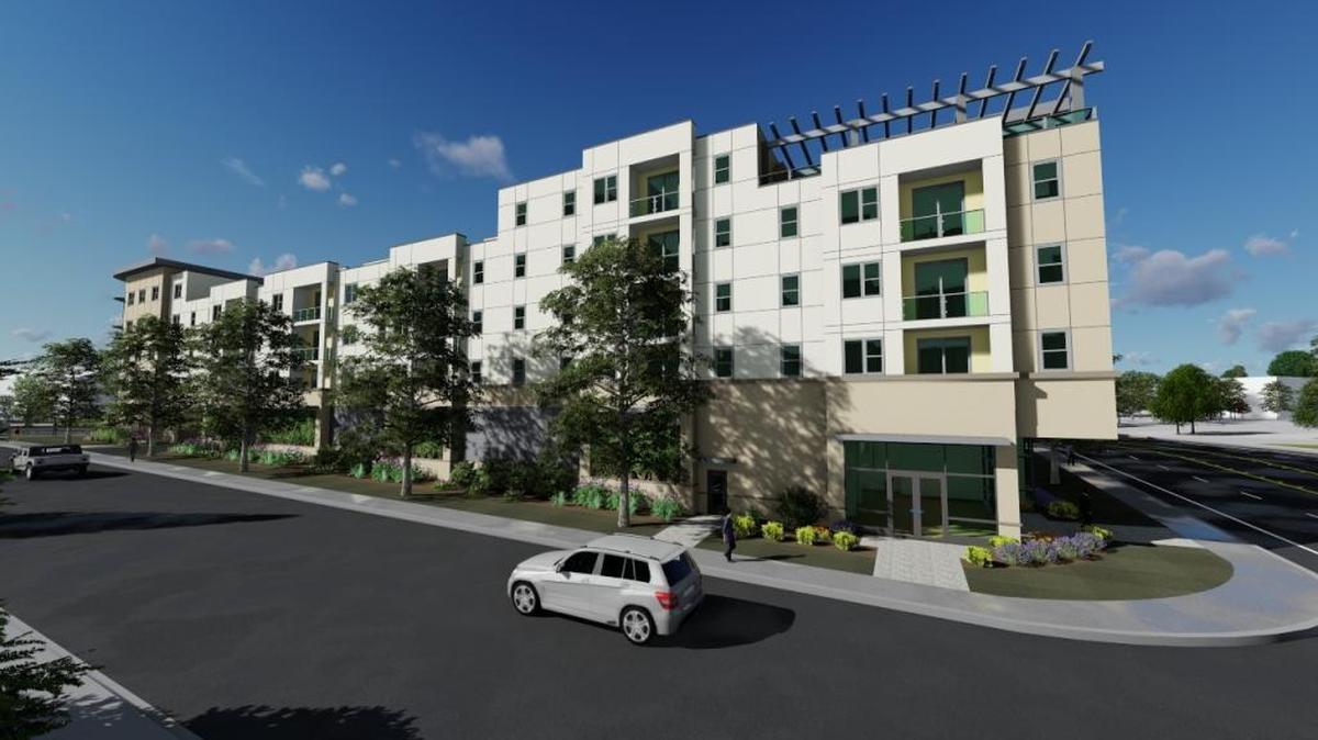 This artist’s rendering shows what Identity Apartments, under construction at the corner of South Oakland Avenue and West Beacon Streets, will look like when completed next year.