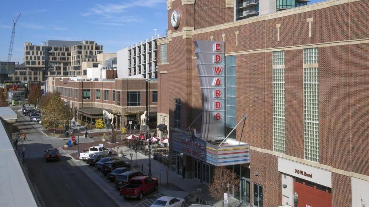 The Edwards Boise Downtown theater, right, and P.F. Changs, across South 8th Street, are tenants in two of the three BoDo buildings recently sold to a Wisconsin company. This photo was taken from the parking garage, where the ground-floor business spaces were also part of the deal.