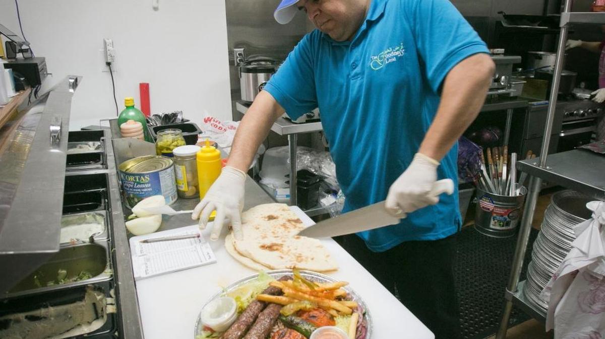 Salam Bunyan, owner of The Goodness Land, which serves Iraqi/Middle Eastern cuisine is reopening his restaurant on Overland Road. He’s pictured here in 2015 at his restaurant in the Boise International Market before it burned down in September.