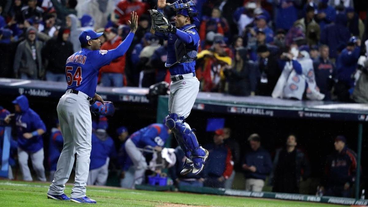 Chicago Cubs pitcher Aroldis Chapman (54) and catcher Willson Contreras celebrate the final out Wednesday in a 5-1 victory against the Cleveland Indians in Game 2 of the World Series at Progressive Field in Cleveland.