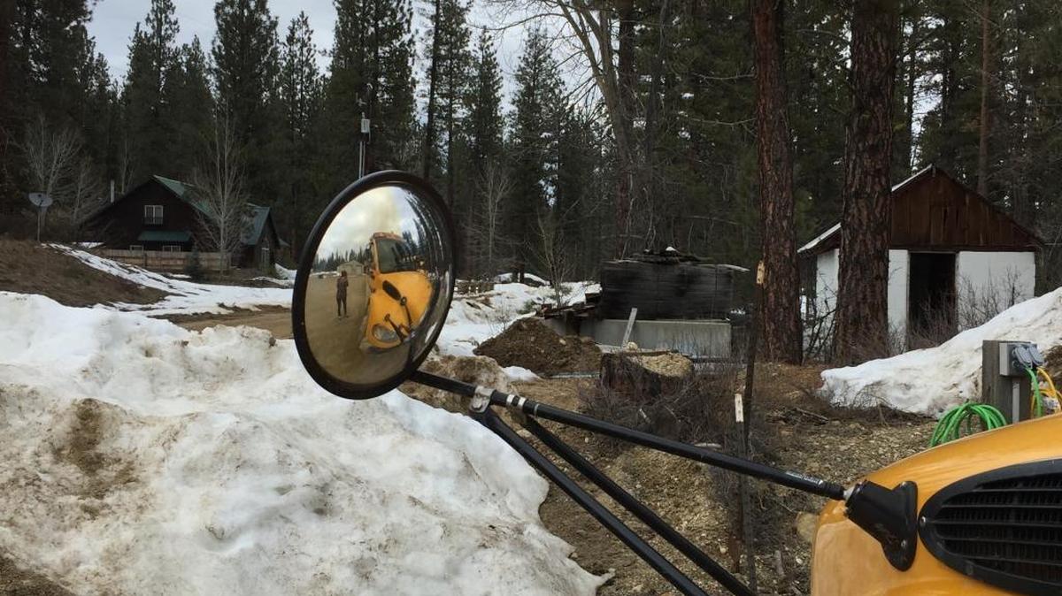 Half of the 66 miles Dowain Geesey drives his school bus each morning and afternoon are on dirt roads.