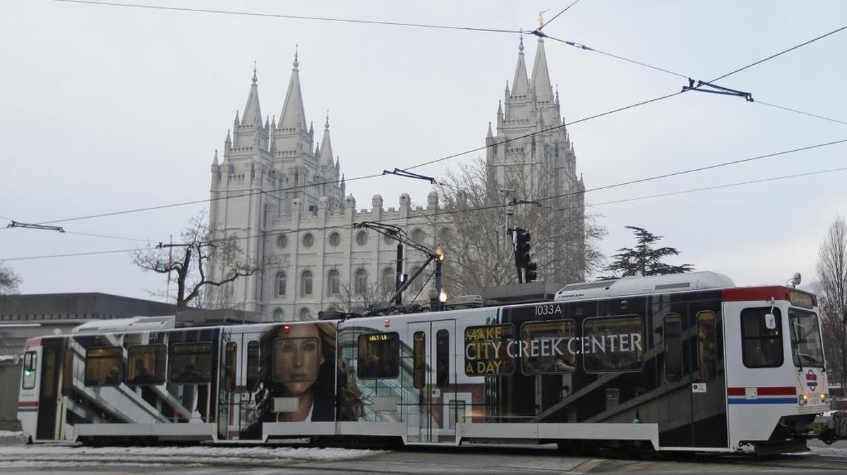 A light rail rolls past the Salt Lake Temple in Salt Lake City. Started with the 2002 Winter Olympics in mind, Salt Lake City’s light-rail network was built to ease air pollution and traffic congestion. Some companies have cited the rail lines as one reason they located or added jobs nearby.