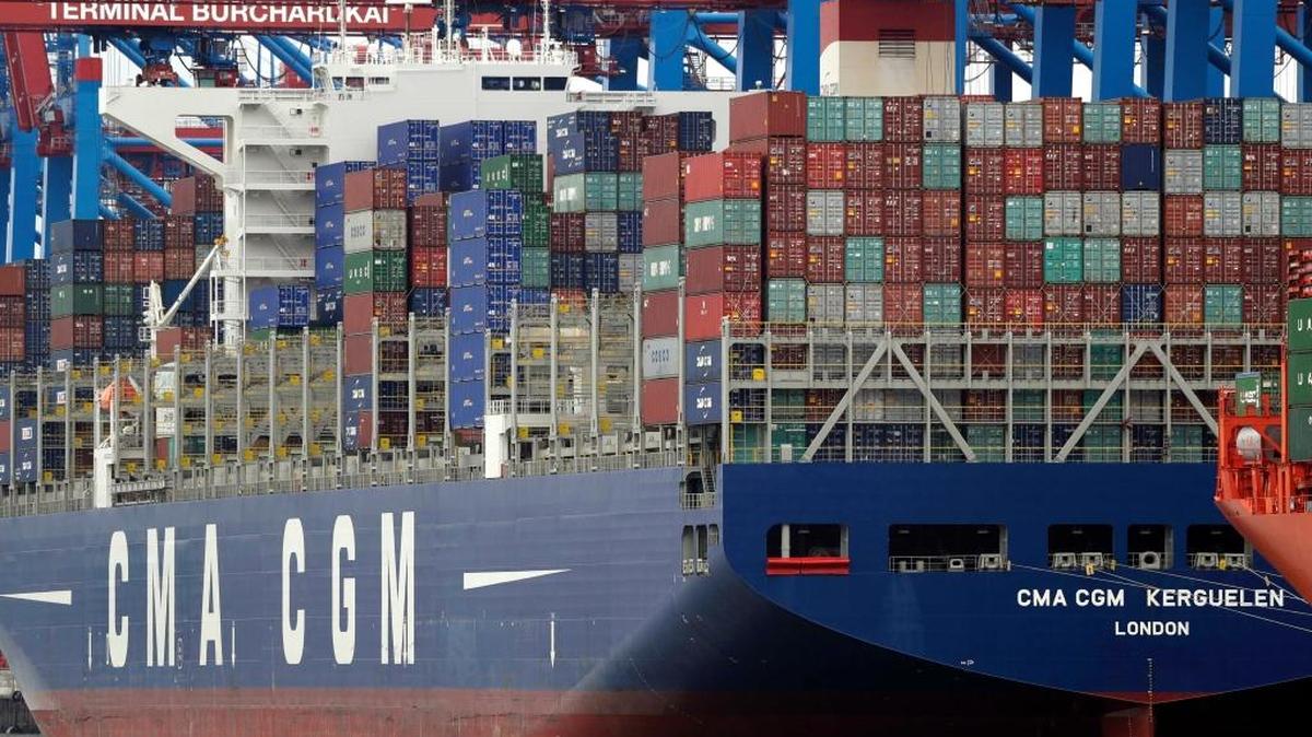Shipping containers are stacked on a ship in port in Hamburg, Germany. President Donald Trump keeps criticizing Germany’s trade surplus with the United States. Germans respond by saying their products are just better and people want to buy them.