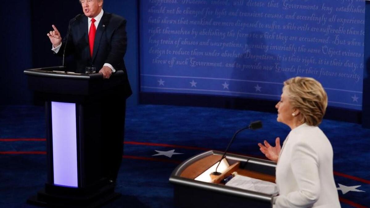 Republican presidential nominee Donald Trump debates with Democratic presidential nominee Hillary Clinton during the third presidential debate at UNLV in Las Vegas on Oct. 19.