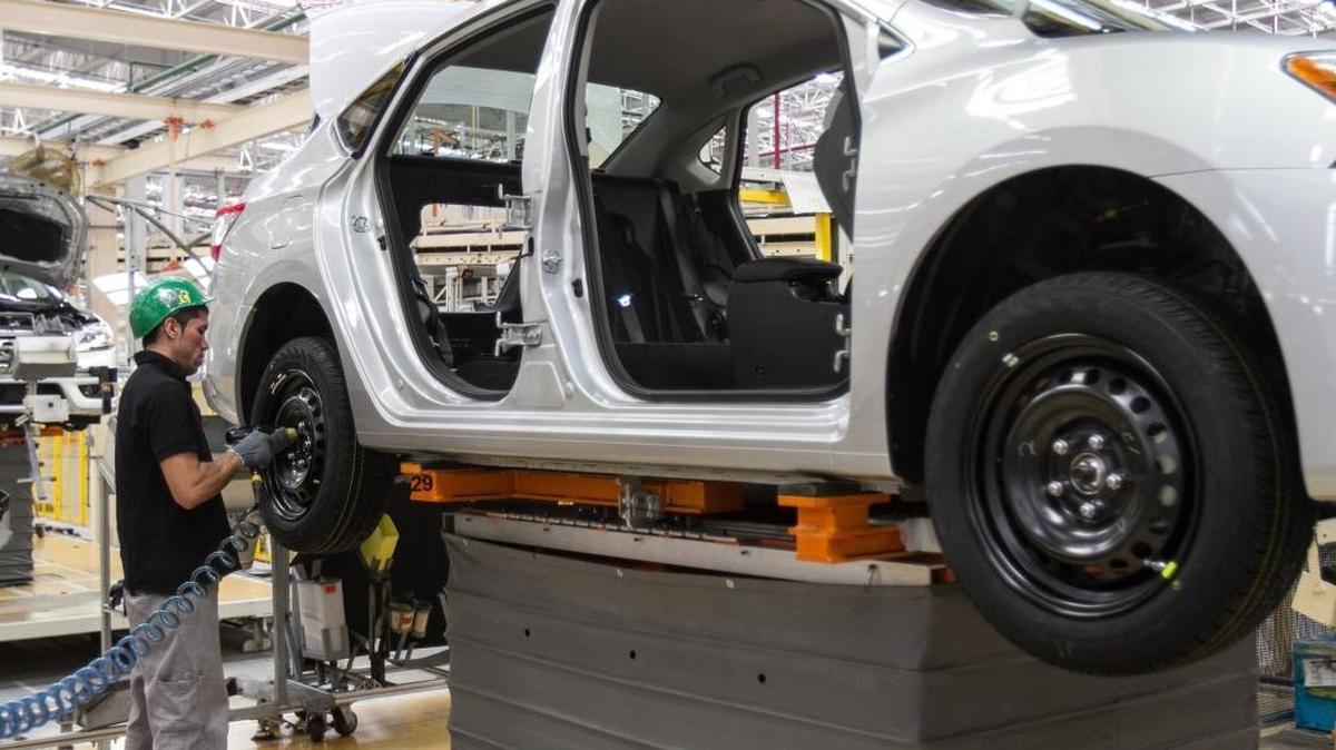 Mexico’s efforts to develop its economy have made it one of the world’s top 10 car-exporting nations. NAFTA was one of those efforts. A worker screws a wheel of a car in a Nissan factory in Aguascalientes in 2014.