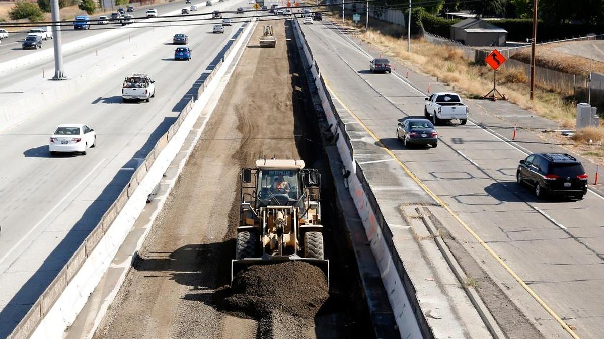 Vehicles pass a highway construction site on Interstate 80 in Sacramento. The nation’s infrastructure is in need of repair and improvement. On that, politicians generally agree. Harder to answer: How to pay for it, and which projects should take priority? A reliable infrastructure system is important for the nation’s economy, safety and quality of life.