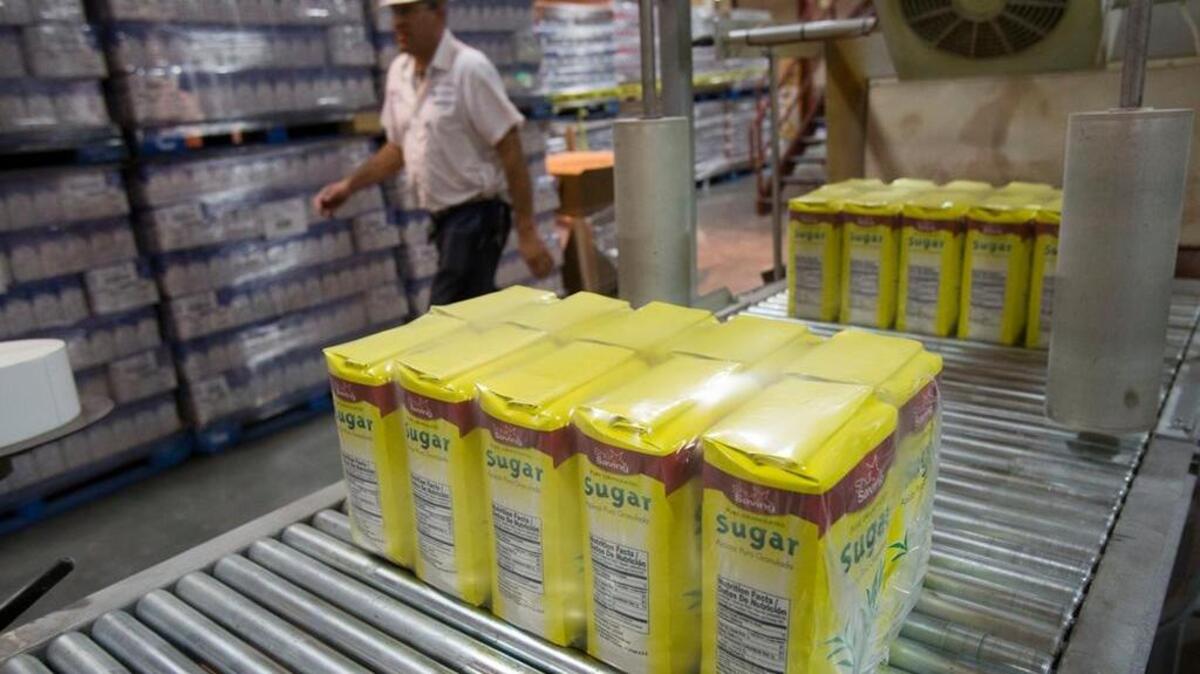 An employee in the packaging area of Amalgamated Sugar Co.’s Nampa plant in 2014. What has become known as the W-2 email phishing scam snared the company in late February, putting employees’ Social Security numbers and other private information at risk. “This is one of the most dangerous email phishing scams we’ve seen in a long time,” says IRS Commissioner John Koskinen.