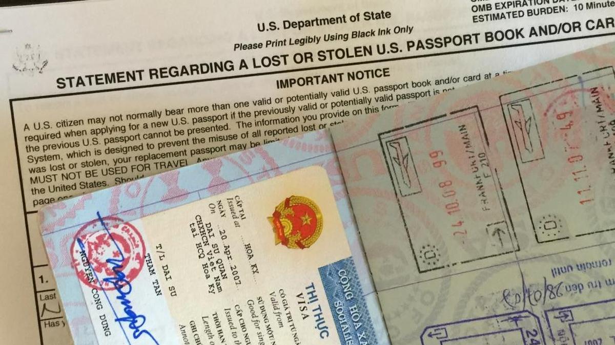 An expired passport from Vietnam and a form for reporting a lost or stolen passport.
