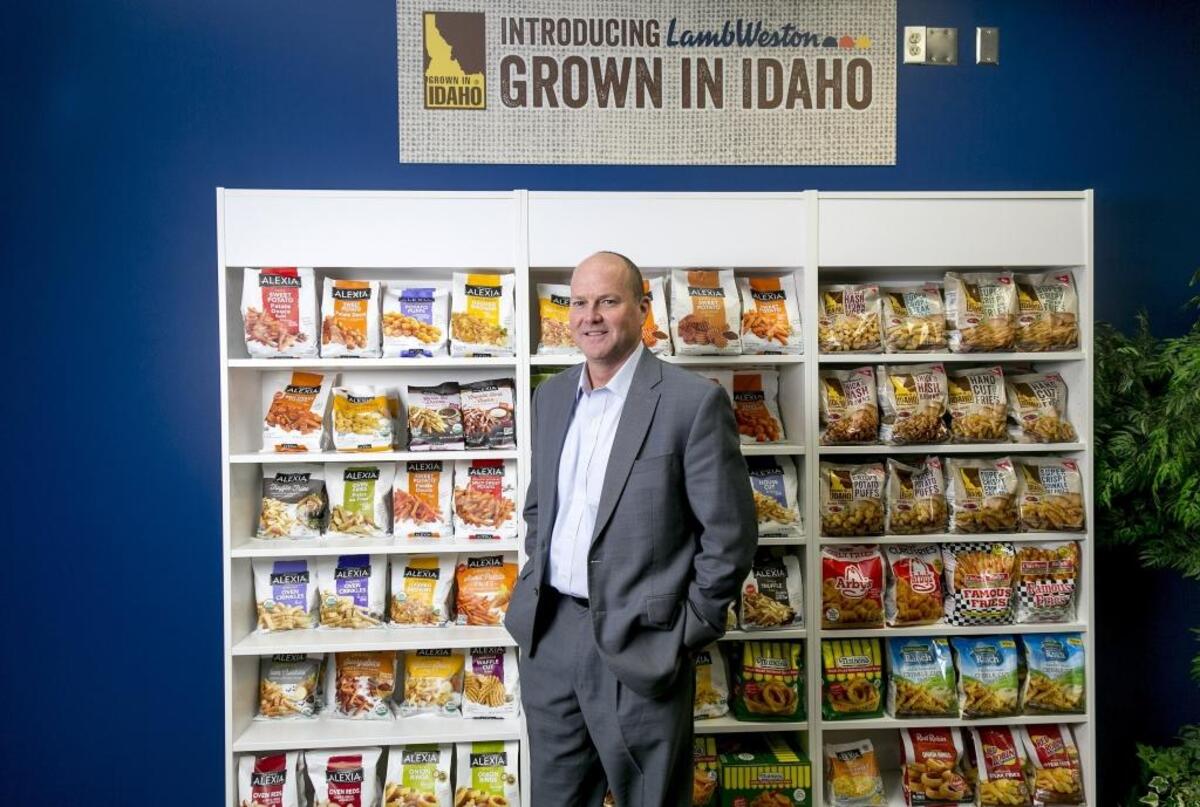 Thomas Werner in front of a display of Lamb Weston’s frozen-potato products at its new Boise office. “When you boil it down, people love fries, and we sell fries,” he says.