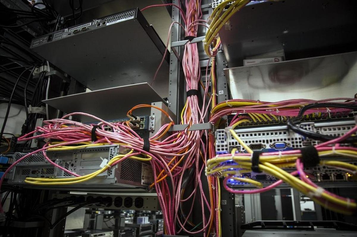 Hundreds of servers on racks are kept in an ideal-performance environment at Fiberpipe Data Centers in Boise.
