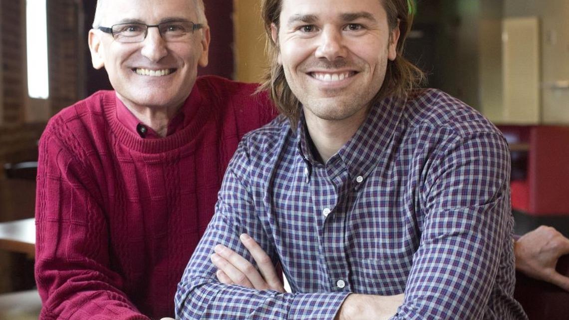 Ron Price, left, poses with his son, Dan Price, last December in Boise. The Statesman interviewed Ron Price, a well-known business speaker and consultant in town, and his son shortly after Entrepreneur Magazine named Dan Price Entrepreneur of the Year and printed his visage on its cover.