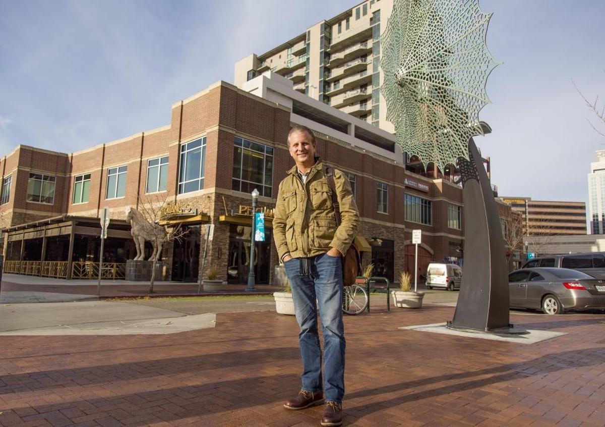 Rob Gerbitz, CEO of Hendricks Commercial Properties of Beloit, Wisconsin, stands in Boise’s BoDo district after his company bought the properties two years ago. The company plans a food hall in the building out of the frame on the right.