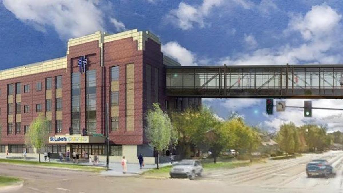A sky bridge will connect the coming Children’s Pavilion, left, to the St. Luke’s Children’s Hospital. The outpatient pavilion will allow the Downtown Boise hospital to bring together pediatric doctors, nurses and other support staff in a one-stop shop for patients.