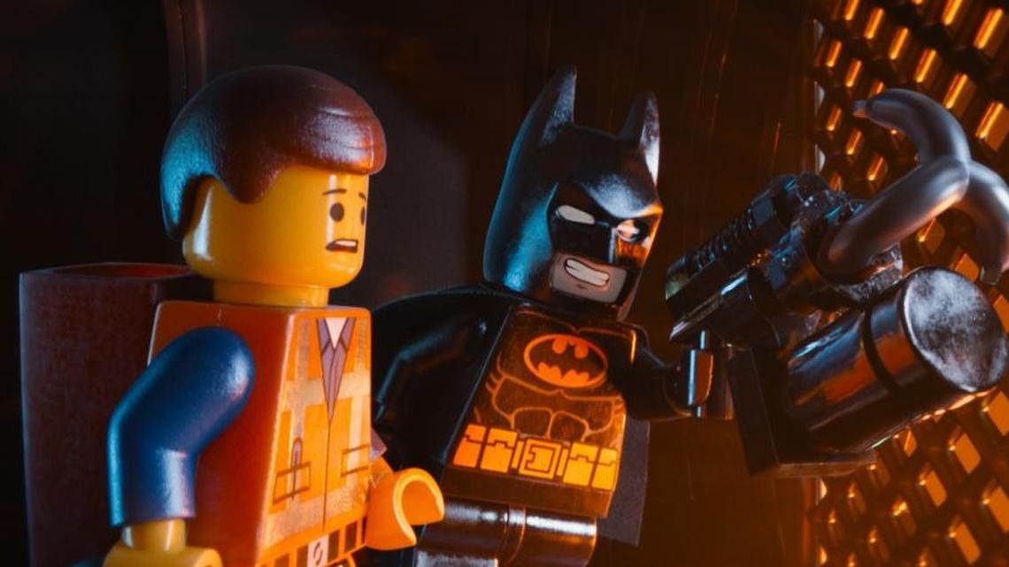 The characters Emmet, voiced by Chris Pratt, left, and Batman, voiced by Will Arnett, in a scene from 2014’s “The Lego Movie.”