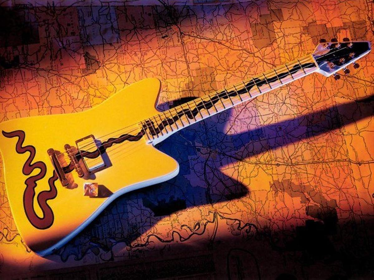John Bolin and Billy Gibbons collaborated on the Muddywood Guitar made from wood salvaged from Muddy Water’s home.