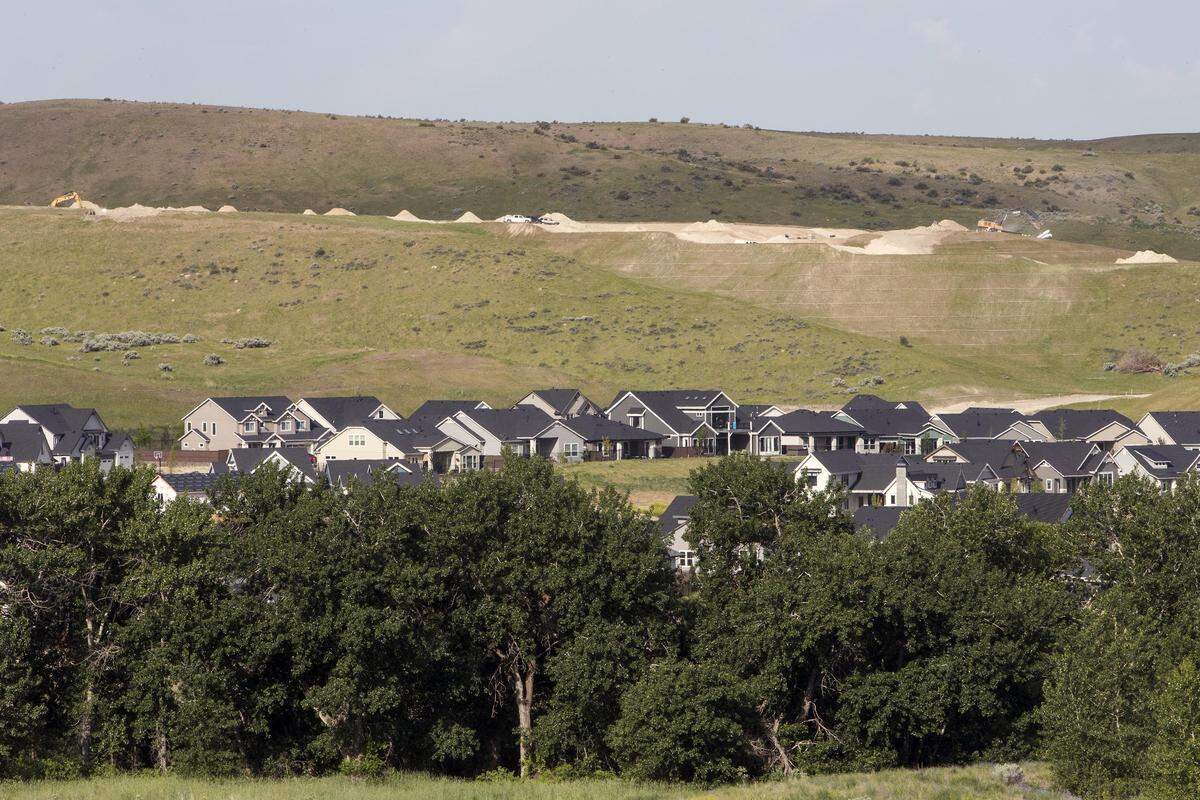 Bedroom communities like Cartwright Ranch, above, where dozens of homes have been built with hundreds more to come; and the adjacent Hidden Springs, which is mostly finished, are bringing more traffic to the Boise area,  adding to some already congested roads.