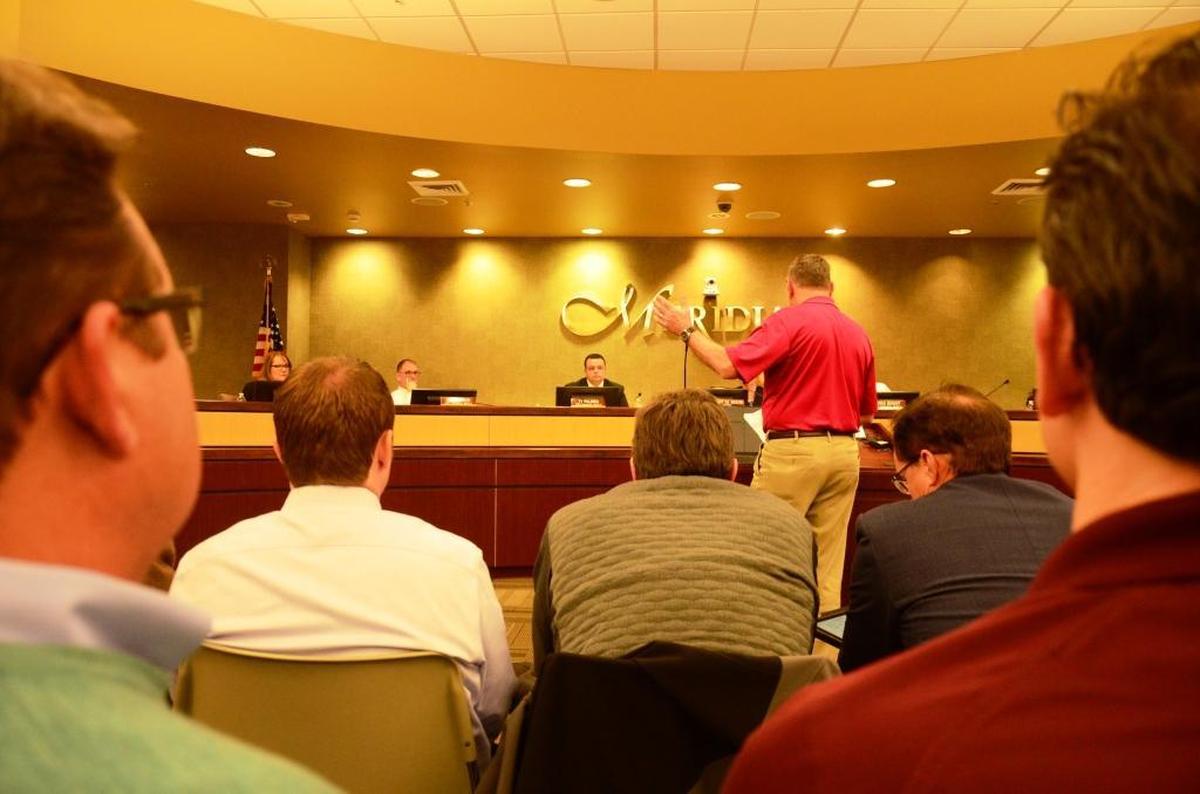An opponent of the Costco Wholesale location addresses the Meridian City Council on Tuesday evening.