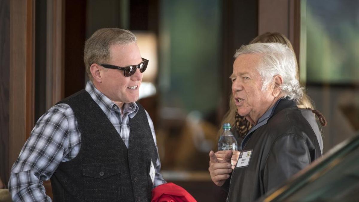 David Zaslav, president and chief executive officer of Discovery Communications, left, and Robert Kraft, owner of the New England Patriots, speak as they arrive Tuesday for the Allen & Co. Media and Technology Conference in Sun Valley.