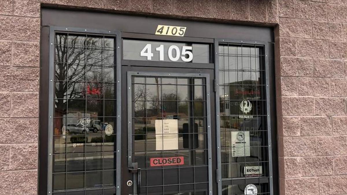 A sign on Boise Gun Co.’s door says “Closed until further notice.”