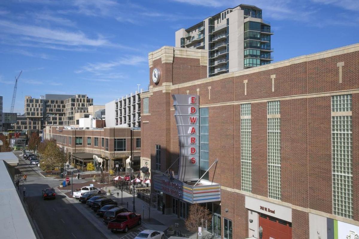 The Edwards Boise Downtown theater, right, was a tenant in two of three BoDo buildings sold to a Wisconsin company in 2017. This photo was taken from a parking garage whose ground-floor business spaces were also part of the deal.