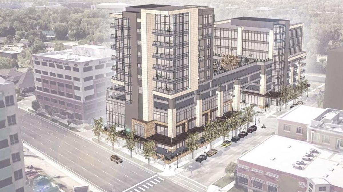 An artist’s rendering shows how two buildings proposed for 5th and Broad streets in Downtown Boise would be linked by a skybridge and a landscaped terrace. Front Street is in the foreground, with Concordia University School of Law at lower right.