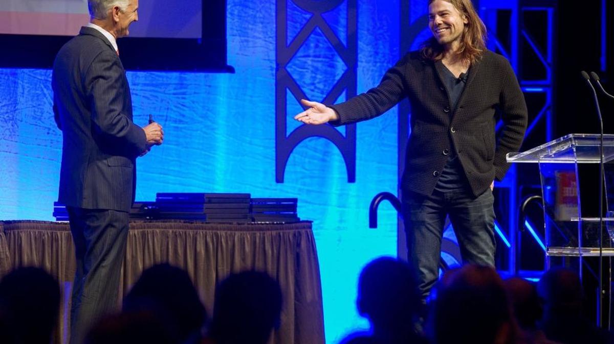 Dan Price, CEO of Gravity Payments in Seattle, apologized to his father, Boise business consultant Ron Price, about his hair and dress Wednesday at the Boise Centre. “I’ve got a great barber and tailor we’re going to visit,” Ron Price said.