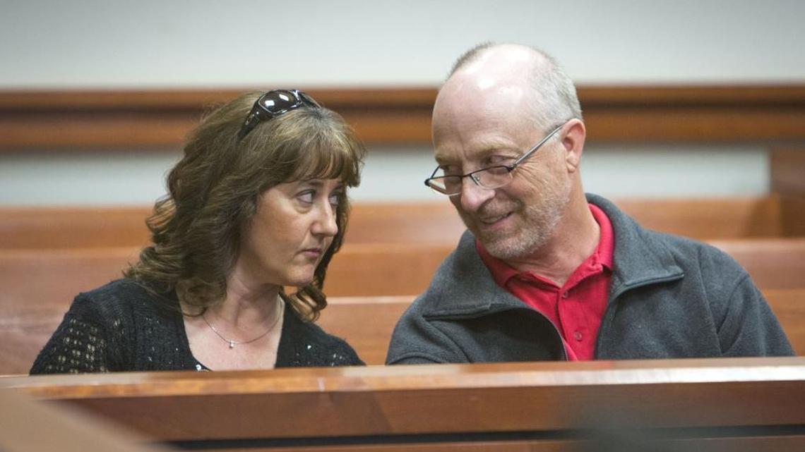 Boise small-business owners Roger Thurston and Dawn Teply talk as their lawyers address Ada County District Judge Steven Hippler about attorney fees during a hearing Wednesday, April 5. The two Safeguard Business Systems franchisees won a combined $10 million after successfully arguing that Safeguard undermined their companies.