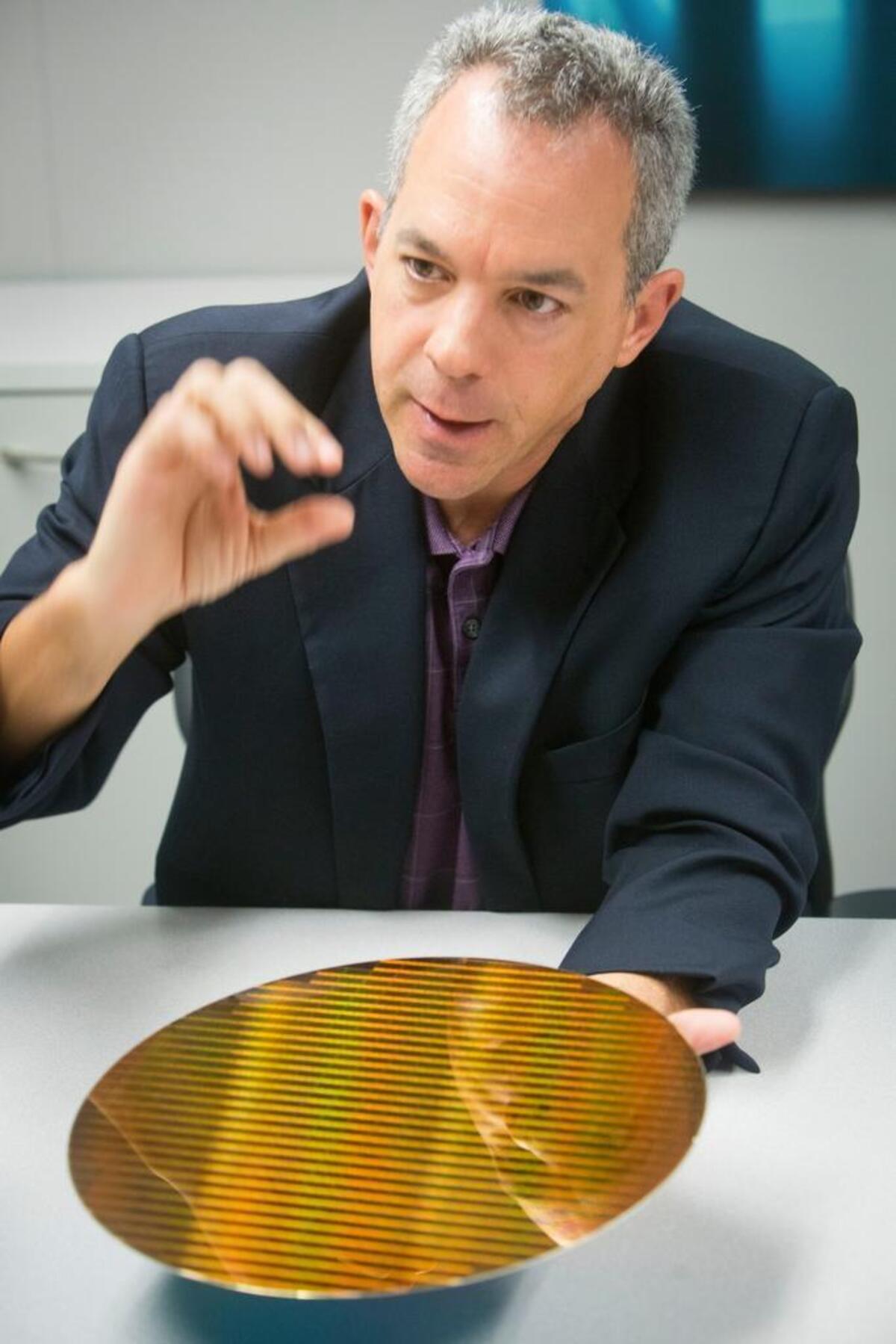 Brian Shirley, senior vice president of DRAM and emerging memory engineering, talks in 2015 about Micron's partnership with Intel to develop vertically stacked layers of chips, which Micron calls 3D XPoint. One key to Micron’s survival of intellectual-property thefts may be its continued advances in technologies.