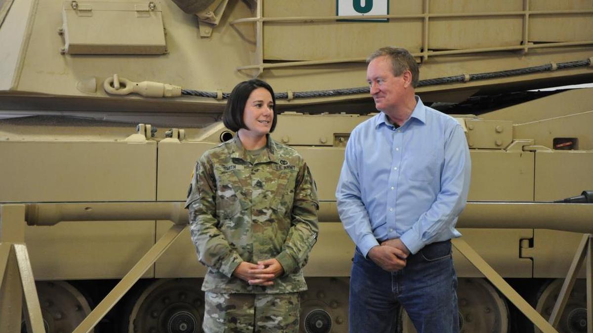 Sgt. 1st Class Erin Smith, left, stands with Sen. Mike Crapo.
