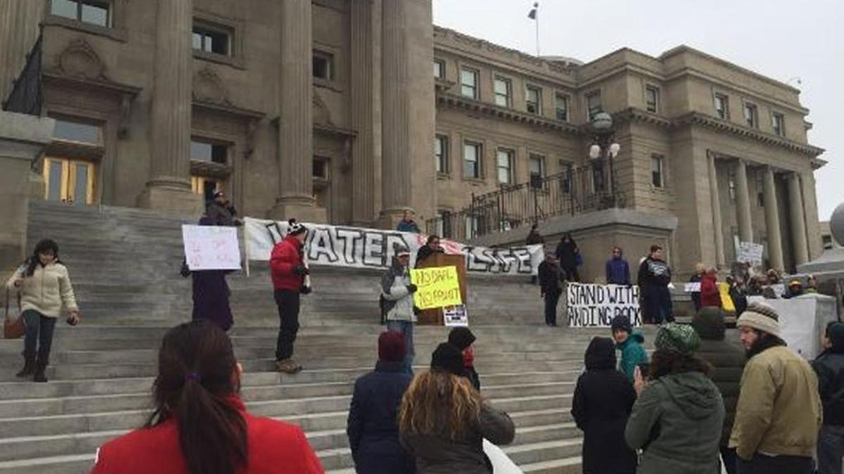 A crowd gathered at the statehouse on Saturday to protest the Dakota Access and Keystone XL pipelines.