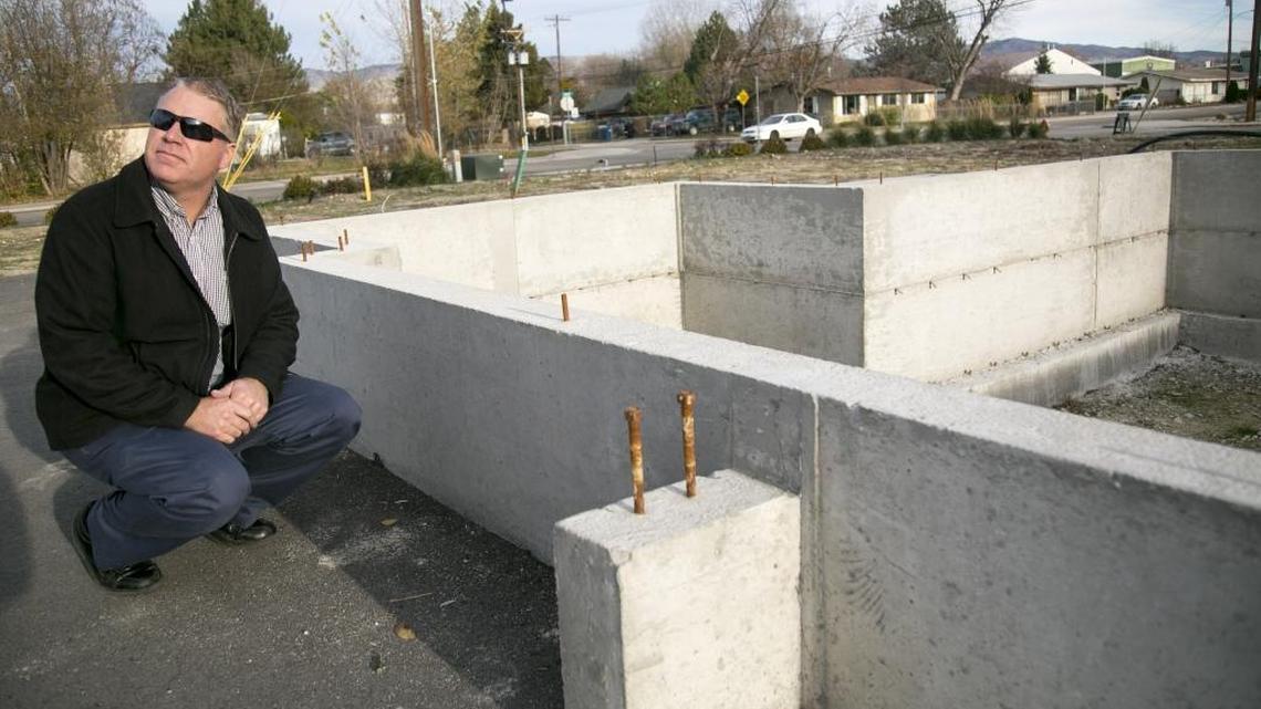 NeighborWorks Boise CEO Bud Compher explains how a home in the Adams Street Cottages project in Garden City is built with a 4-foot-high stem wall instead of the standard 2-foot, in order to raise the house above what could soon be part of the Boise River’s floodplain.