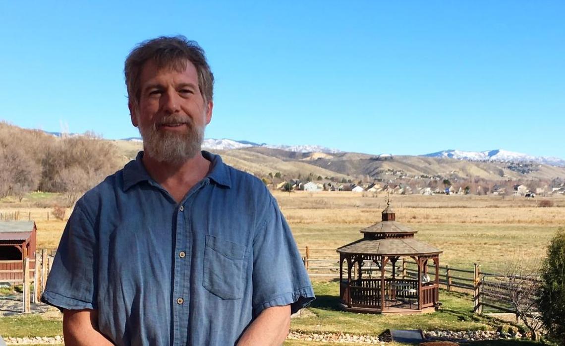 Richard Llewellyn, president of the North West Neighborhood Association, is spearheading the fight against a new subdivision. His family has farmed in the area since the 1950s. A neighbor’s property is a vantage point for the contested land.