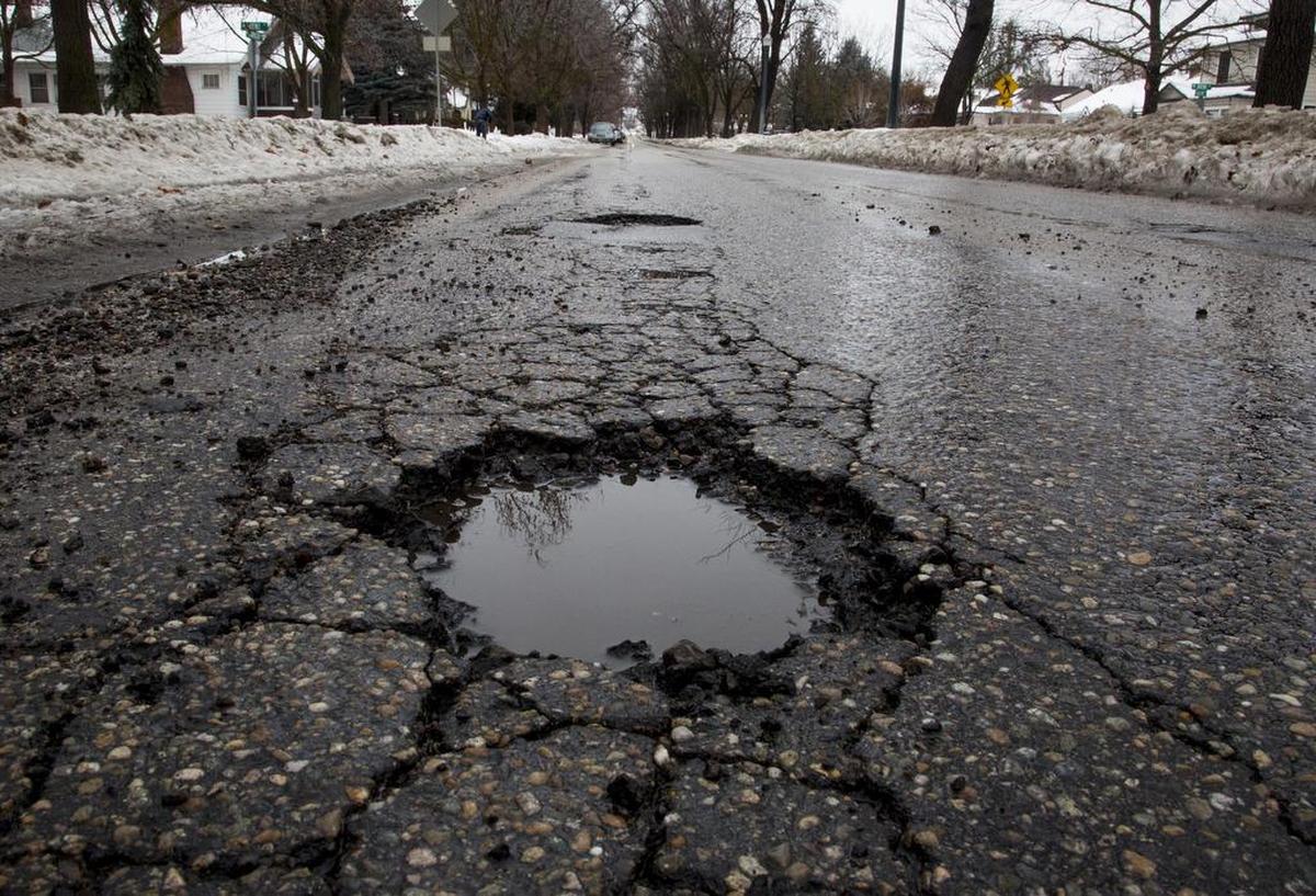 Potholes provide a nuisance for drivers along Harrison Boulevard in Boise’s North End in 2017.