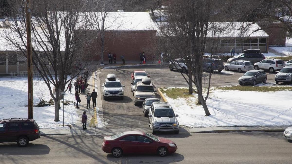 With a small school parking lot, parents picking up students at Highlands Elementary navigate congested traffic at the corner of Bogus Basin Road and West Curling Drive.