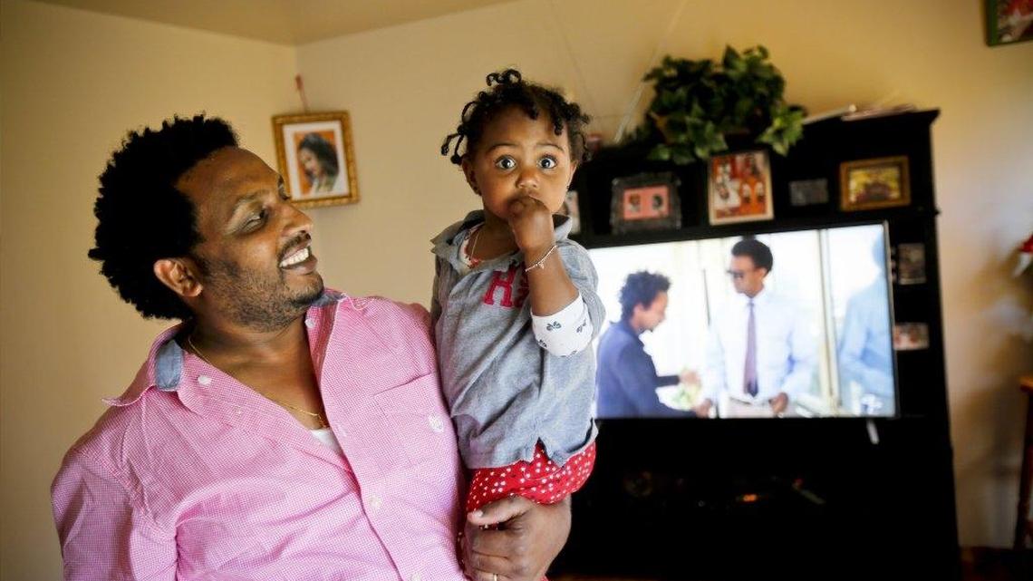 Kibrom Milash, shown here in October with his daughter Naomi Abraha, is one of the displaced Boise International Market businesspeople who will be featured in the Global Community Market starting Saturday.