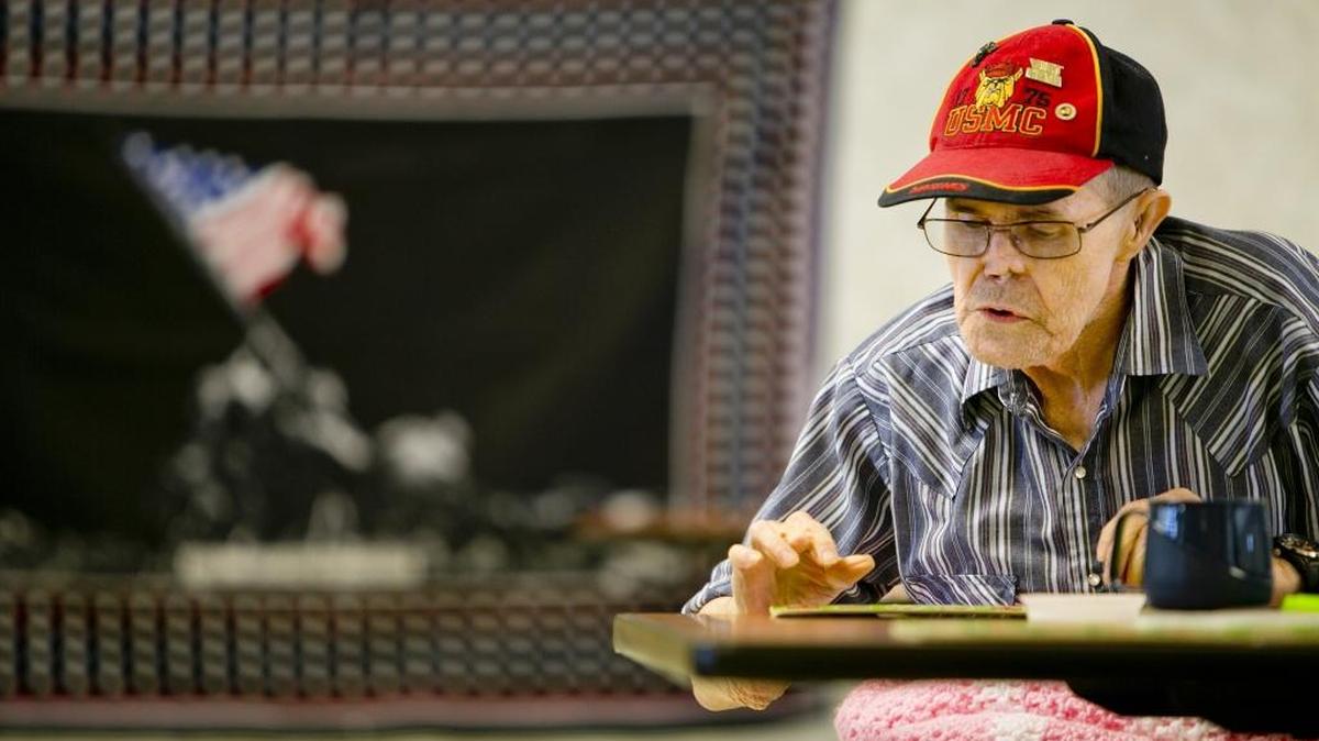 Vietnam veteran Bob Hoops plays bingo at Genesis Health Care in Meridian.