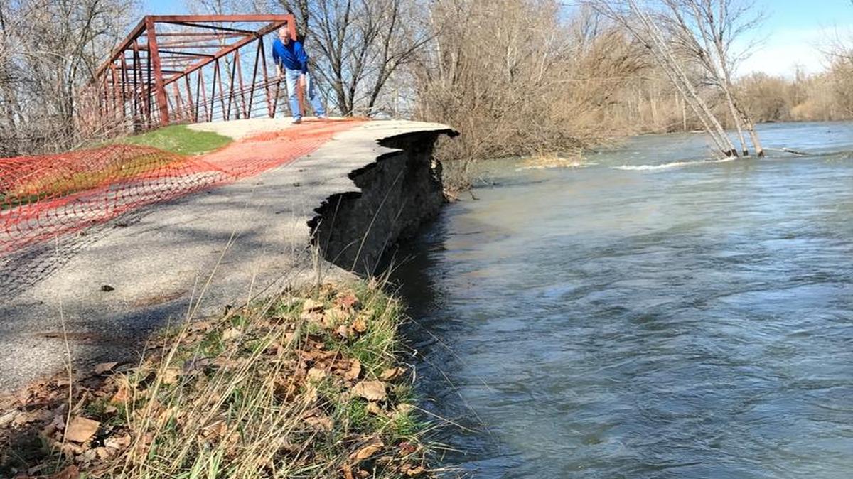 The attached photo shows the erosion and damage done to a section of the Boise River Greenbelt due to the extremely high river flows.
