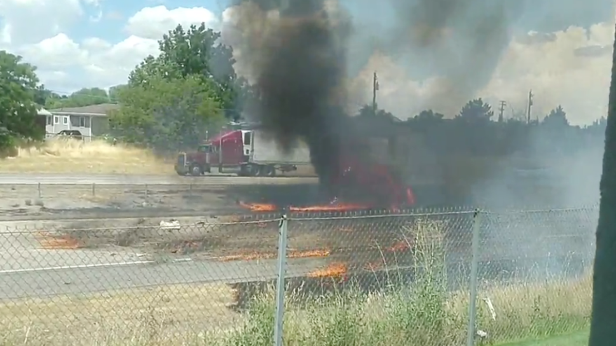 Screenshot from video of plane crash wreckage on Northern Utah freeway July 26.